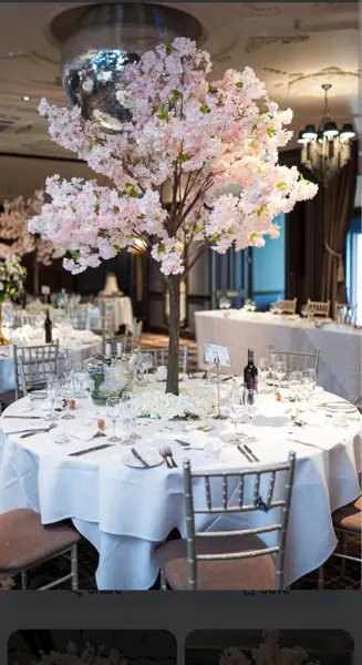 Blossom tree centrepiece on a white table