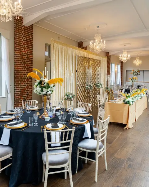Navy tablecloths with yellow and white florals