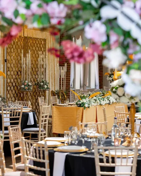 Pink and gold floral centrepieces