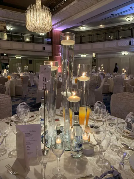 Crystal chandelier centrepiece on a dining table