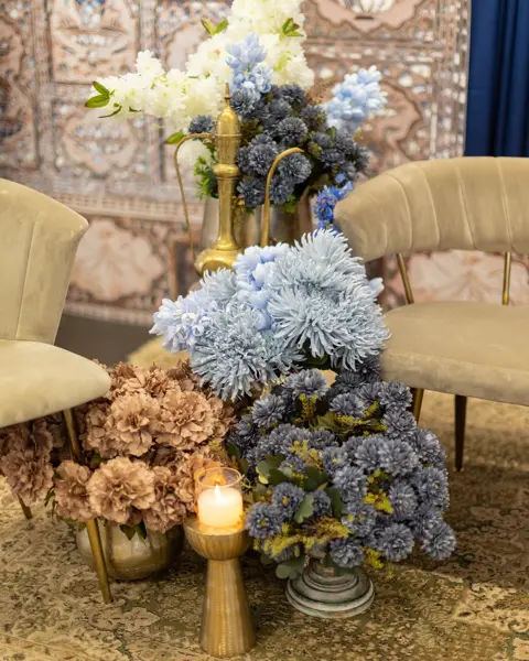 Dried and blue florals with candles