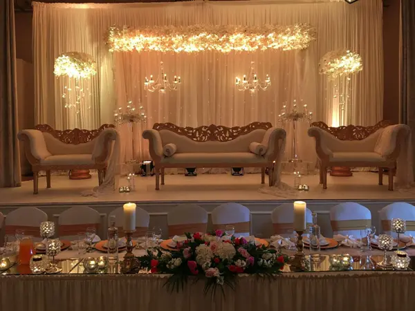 Grand gold stage with ornate sofas