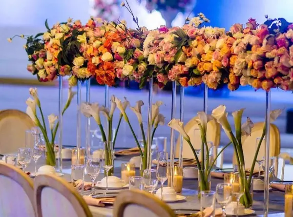 Orange rose runner with calla lilies