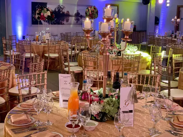 Candelabra tables in a festive room