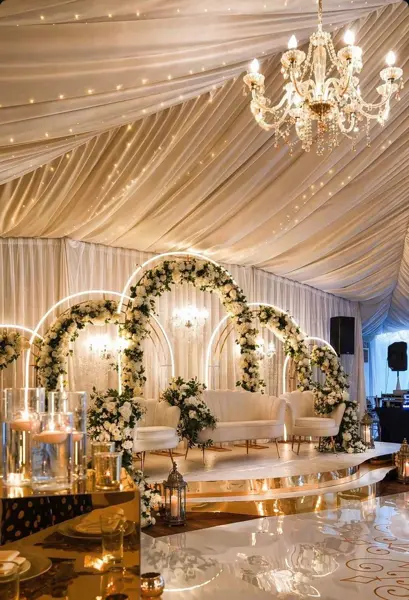 Floral arches in a marquee