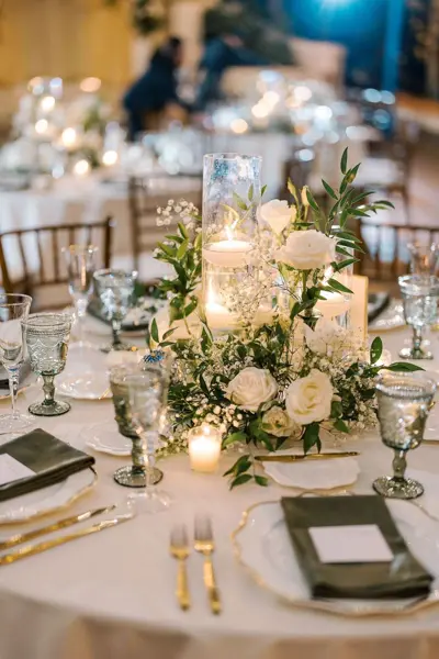 Candlelit white floral centrepiece