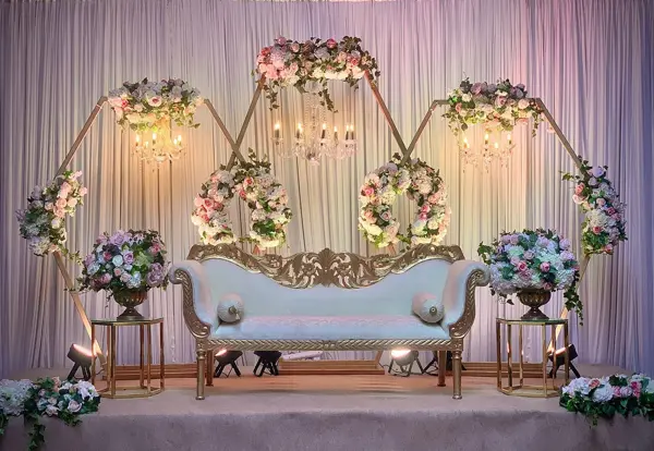 Geometric frames with florals and a white sofa