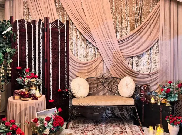 Pink and red draped floral setting