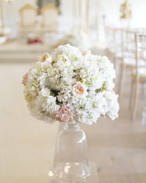 White floral posy in glass