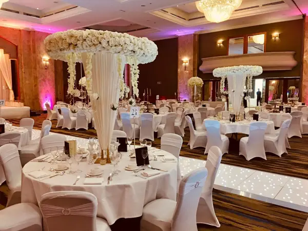 Floating floral centrepieces over a starlit dance floor