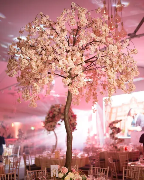 Pink blossom tree in a reception room