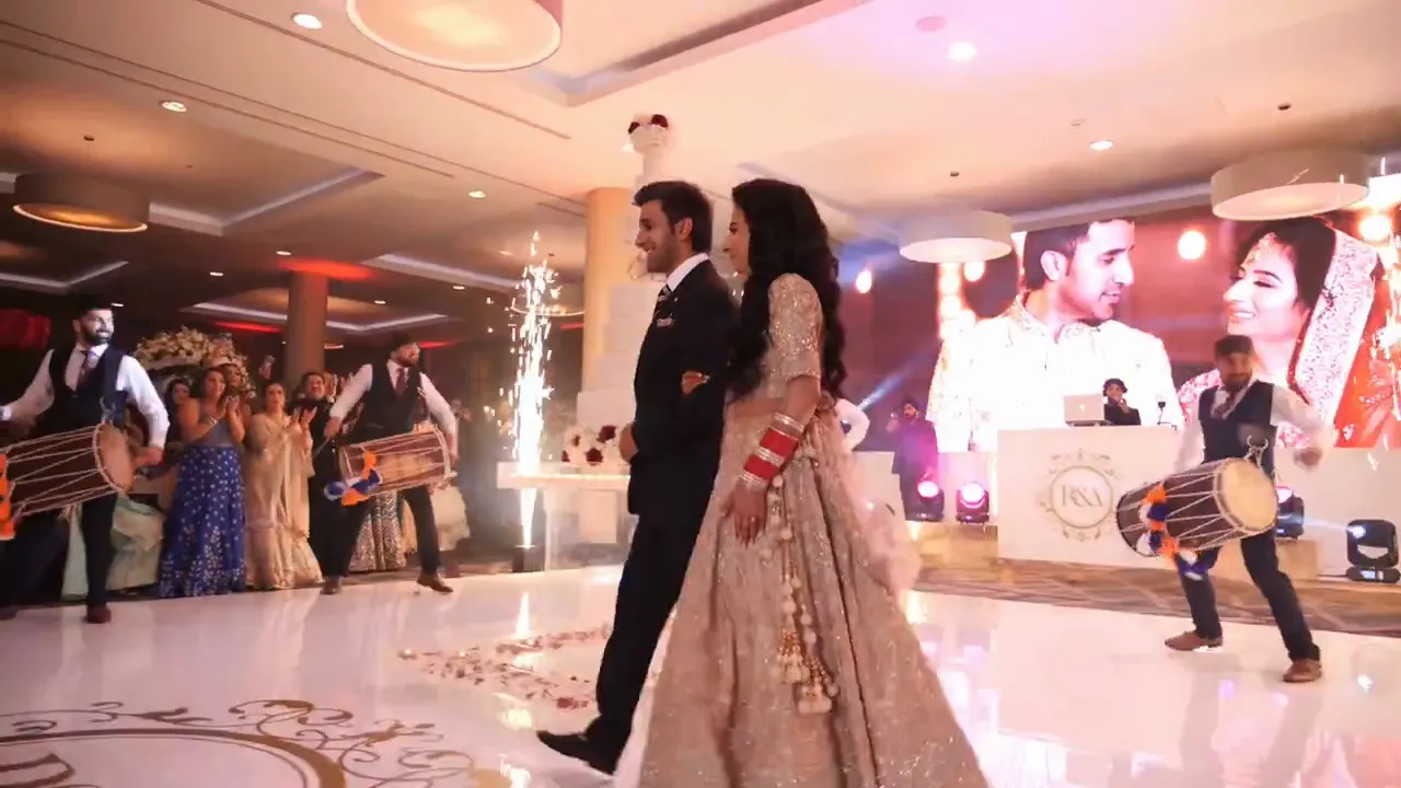Dhol players and a sax player for a bride and groom entrance