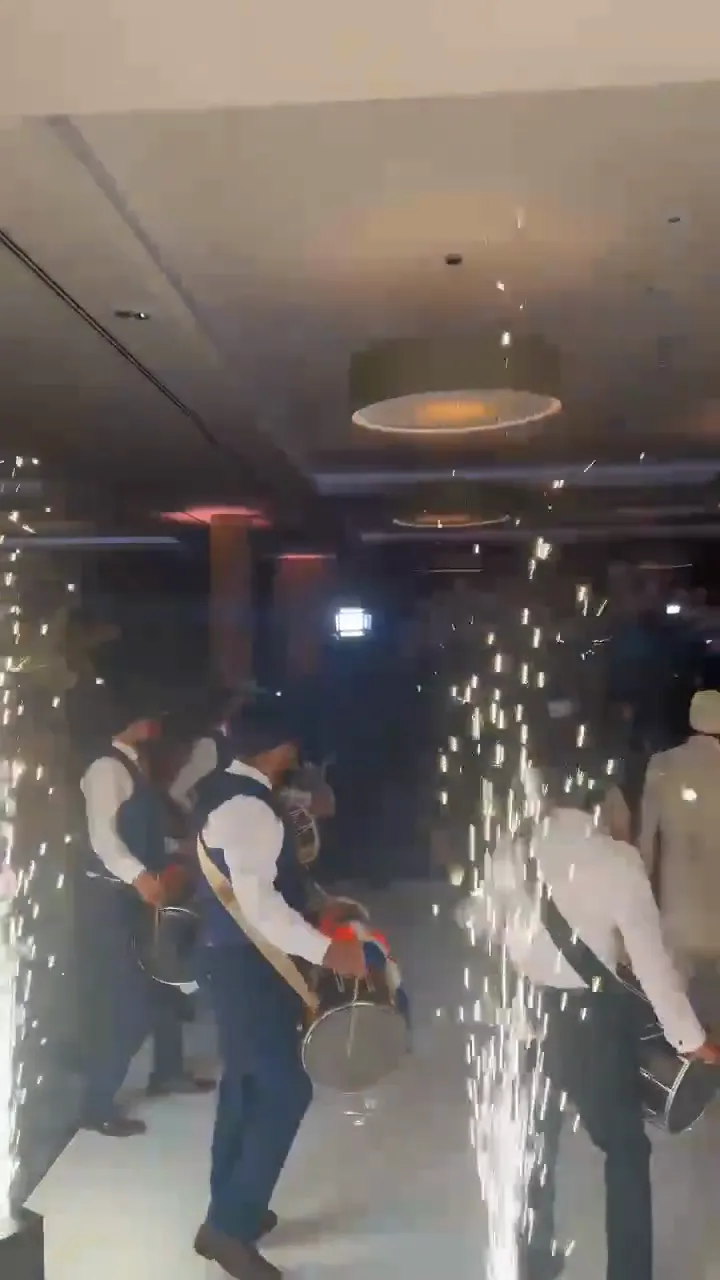 Bride and groom entrance with 12 dhol players, Flitwick