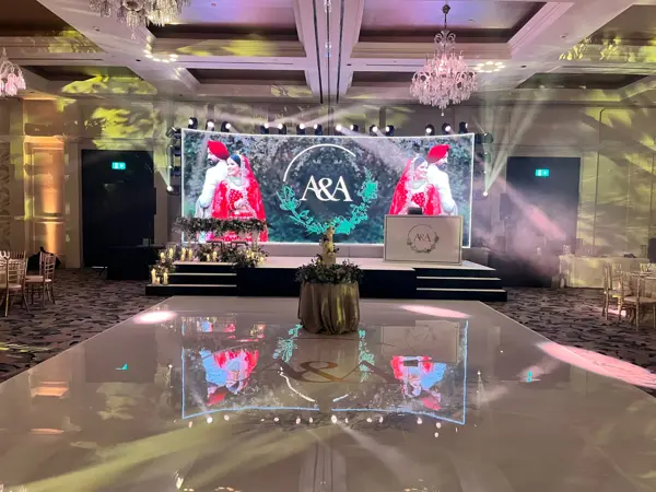 LED screen stage and white gloss dance floor at Fairmont Windsor Park