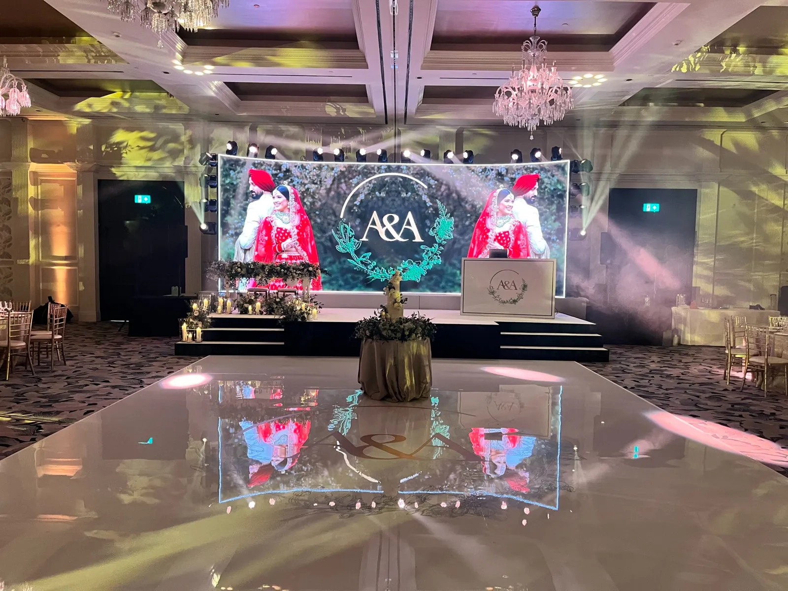LED screen stage and white gloss dance floor at Fairmont Windsor Park