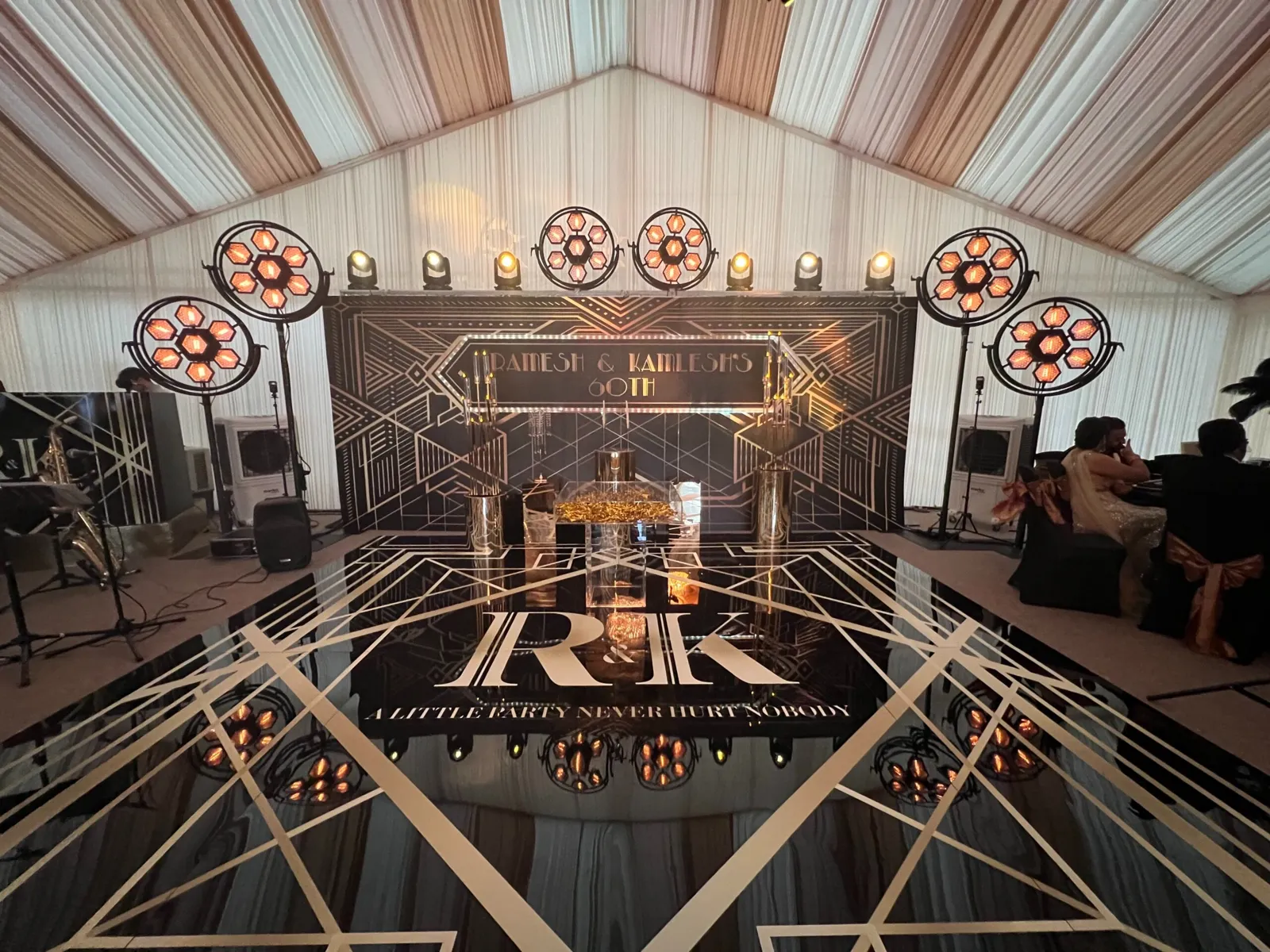 Gatsby themed stage, black gloss dance floor and DJ package