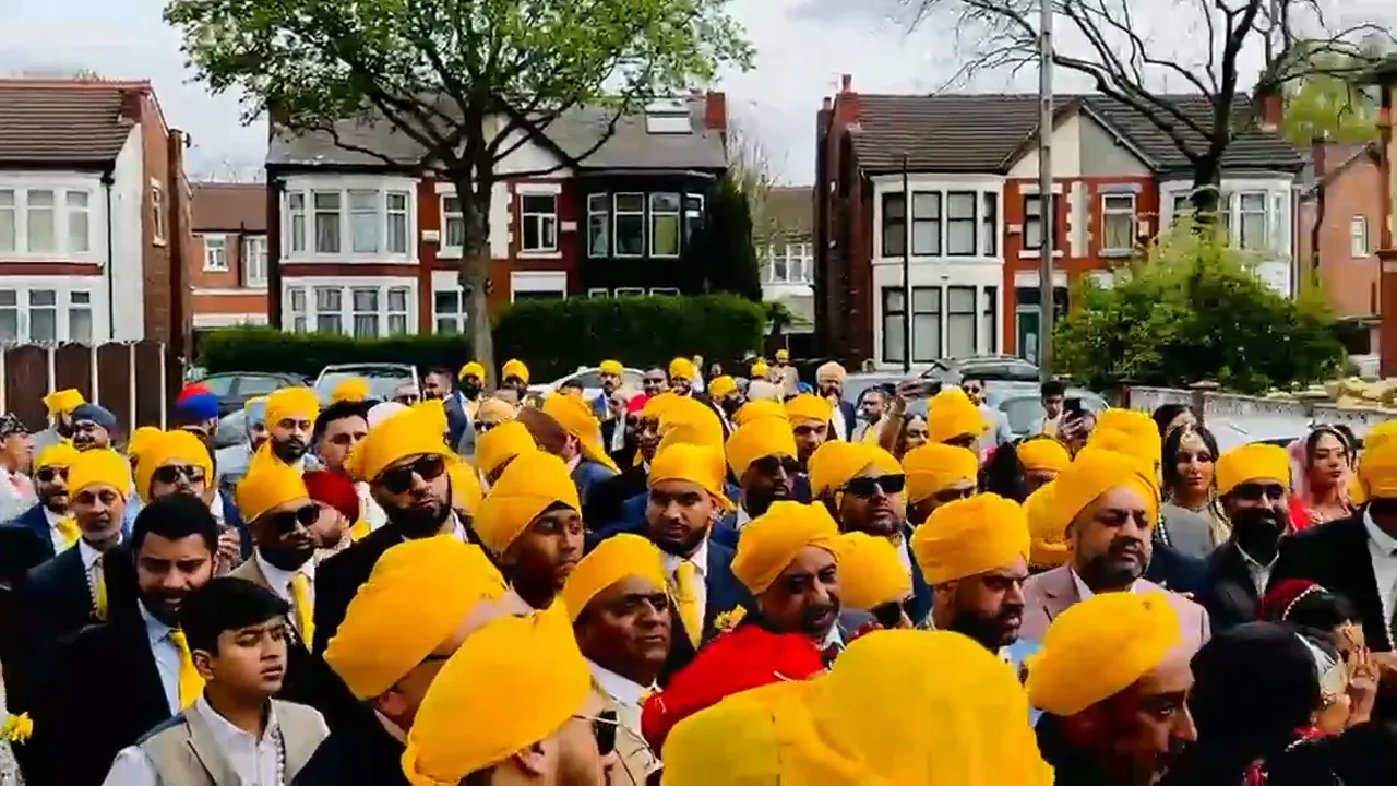 Indian band baja playing at a wedding baraat