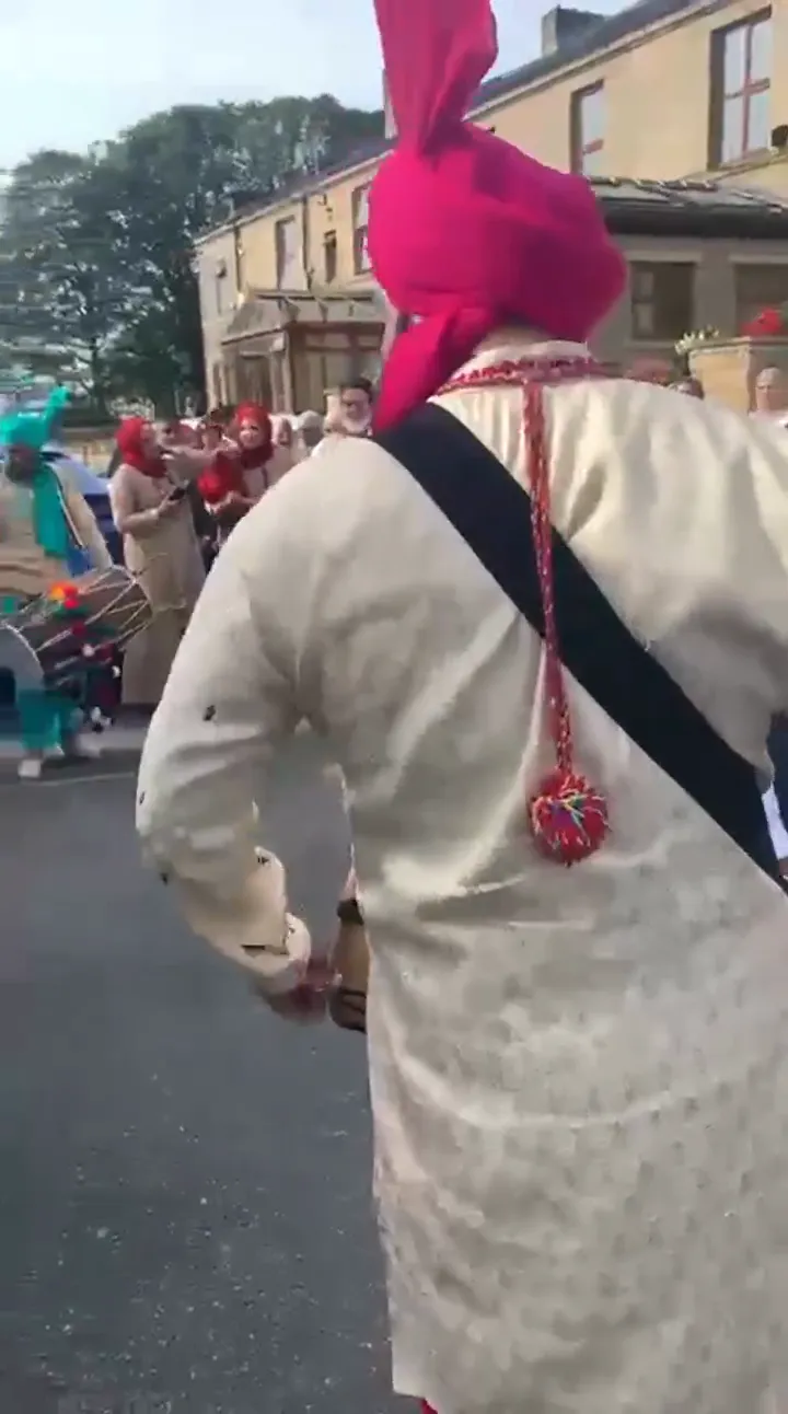 Indian band baja playing at a wedding baraat