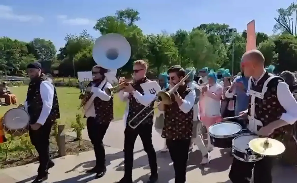 Indian band baja playing at a wedding baraat