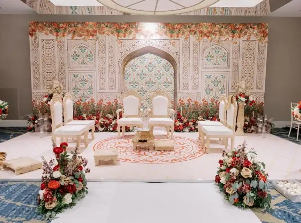 Mandap with a printed carved-pattern backdrop