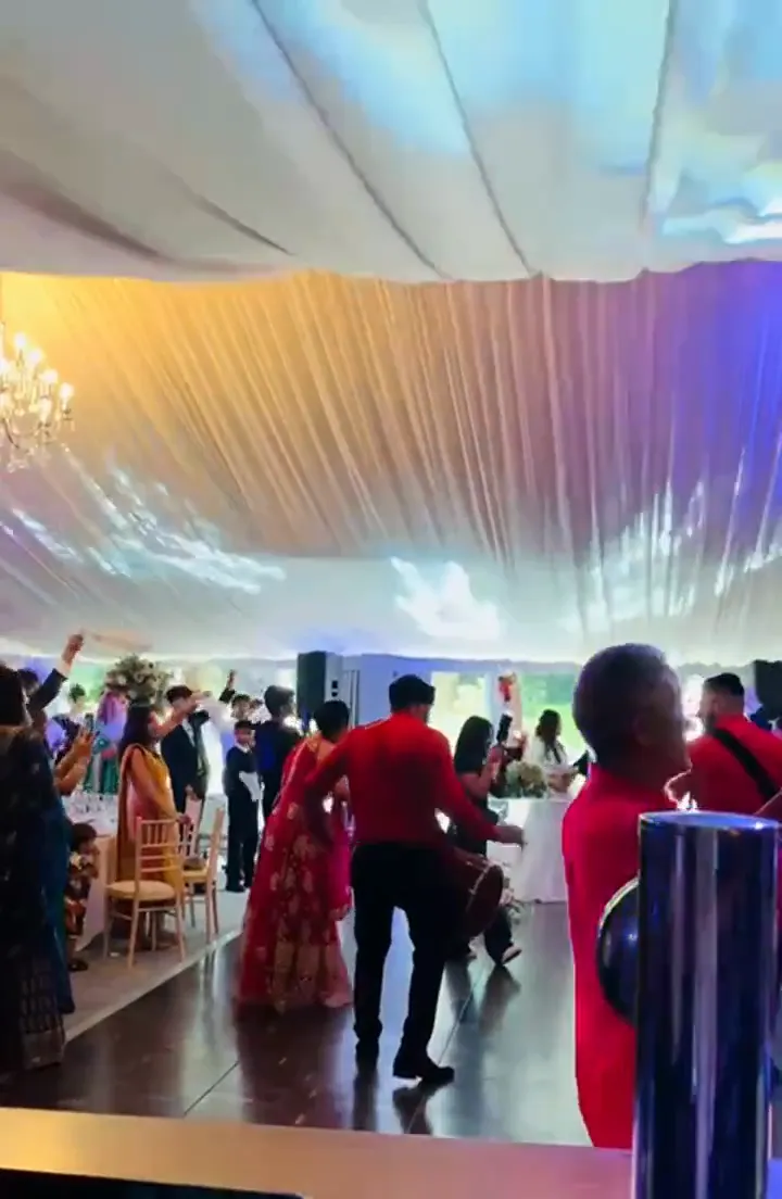 Violinist playing at a marquee reception